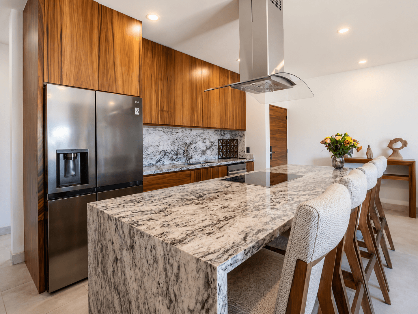 Kitchen with granite countertop.